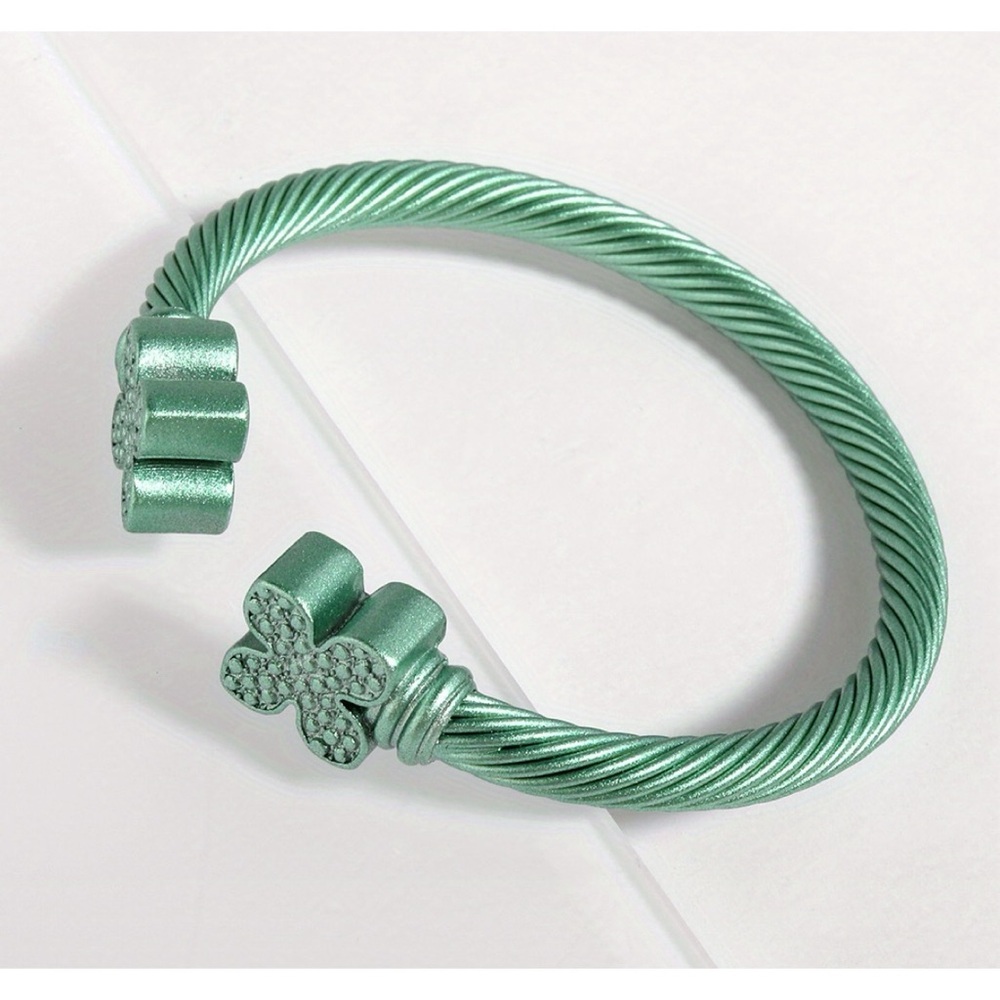Shiny Green cable cuff bracelet with a flower design